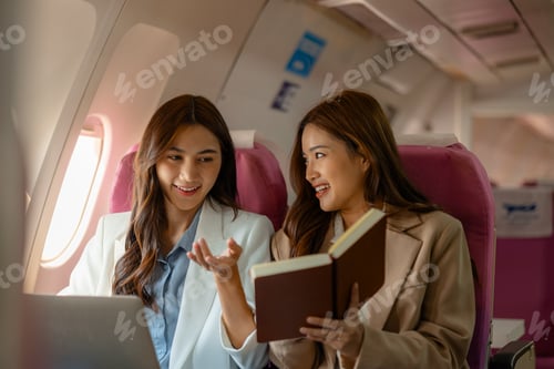 Preview: two beautiful businesswomen were traveling by plane to negotiate sales