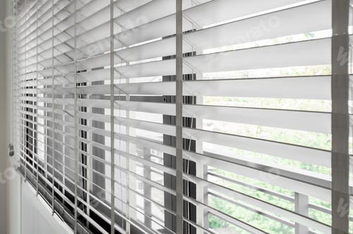 Preview: Closeup white color wooden blind with white ladder tape curtains.