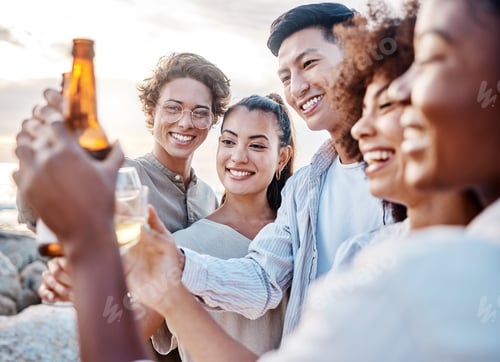 Preview: A group of friends enjoying their time together and celebrating with some alcoholic drinks at the b