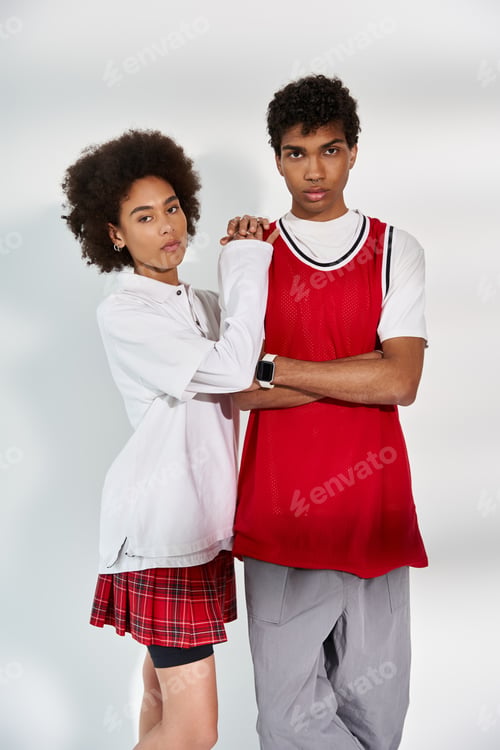Preview: Young couple exuding love and style in a vibrant urban setting during bright daylight hours