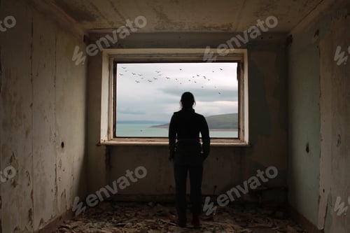 Preview: Silhouette of a man by the window