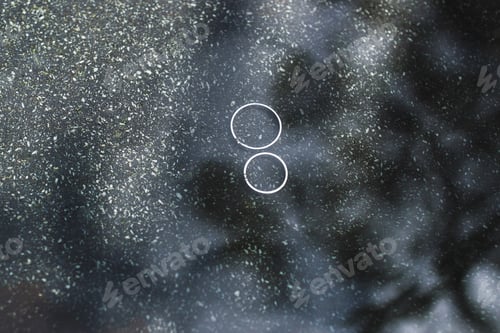 Preview: Two wedding rings under water surface with beautiful light. Unusual Jewelry Photo