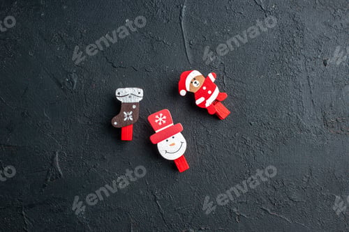 Preview: Top view of new year decoration accessories on black background