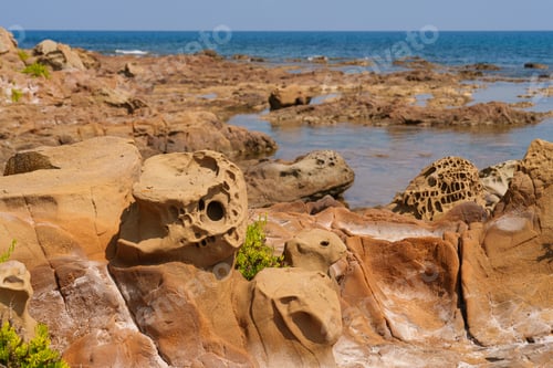 Preview: Eroded Coastal Rocks with Intricate Natural Patterns