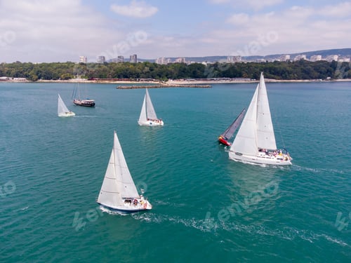 Preview: Aerial view of sailing yachts regatta race on sea