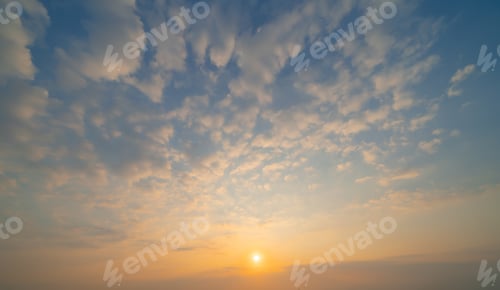 Preview: Sunset sky. Abstract nature background. Dramatic blue and orange, colorful clouds at twilight time.