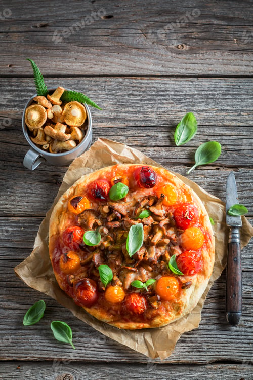 Preview: Tasty pizza on old wooden rustic table