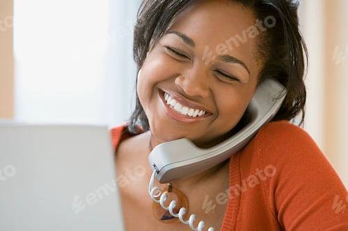 Preview: Happy woman on telephone