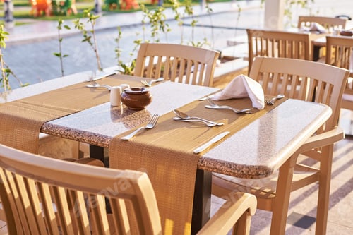 Preview: Empty terrace with a table and chairs outdoor