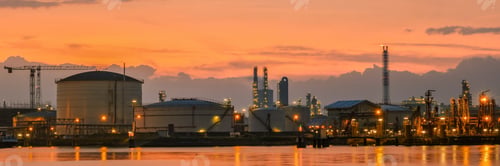 Preview: Antwerp Harbor Belgium Sunset with a large oil tanker at a oil gas LPG terminal