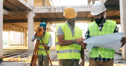 Preview: Portrait of construction engineers working on building site