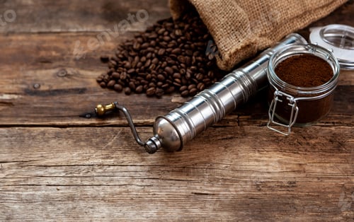 Preview: Coffee beans in a canvas bag on a wooden background.