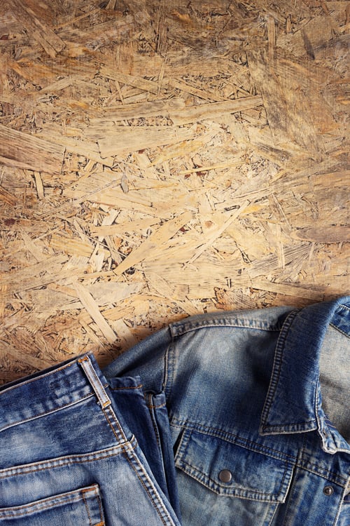 Preview: Blue Denim Jeans and Jacket on Wood Background