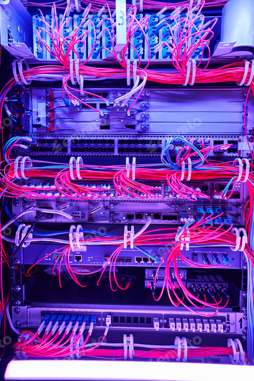 Preview: Arrangement of red fiber optic cables in server hardware