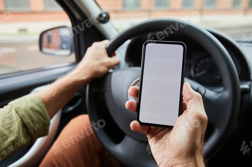 Preview: Driver using Smartphone in Car
