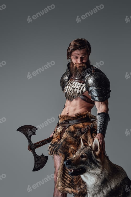 Preview: Mythical nordic barbarian armed with axe posing with wild wolf