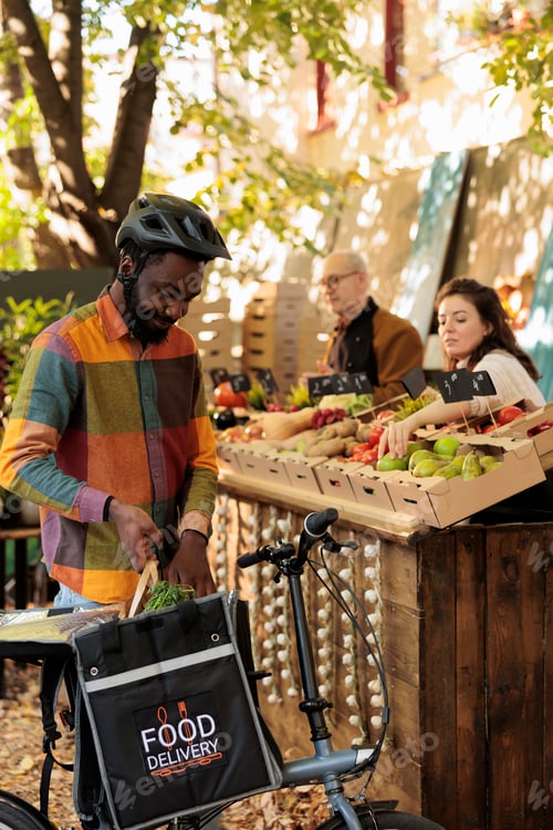Preview: Organic produce delivery services worker picking up food order
