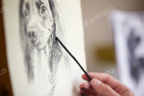 Preview: Close Up Of Artist Sitting At Easel Drawing Picture Of Dog In Charcoal