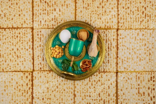 Preview: Jewish matzah, kiddush and seder with egg, bone, herbs and walnuts. Passover holiday concept.