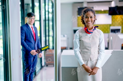 Preview: Portrait of air hostess and airline staff at gate of airport to welcome and check the security