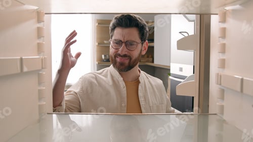 Preview: Point of view POV inside refrigerator Caucasian hungry sad angry frustrated man male guy unhappy
