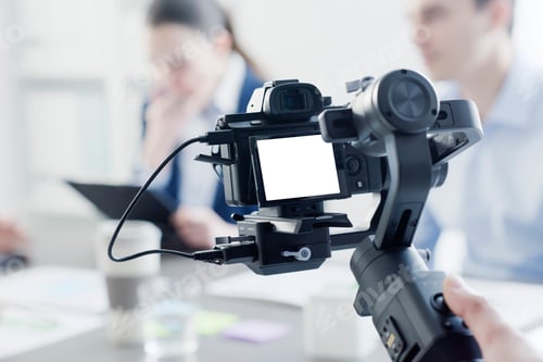 Preview: Professional videomaker shooting a video