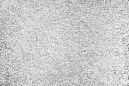 Preview: White abstract grungy textured background.