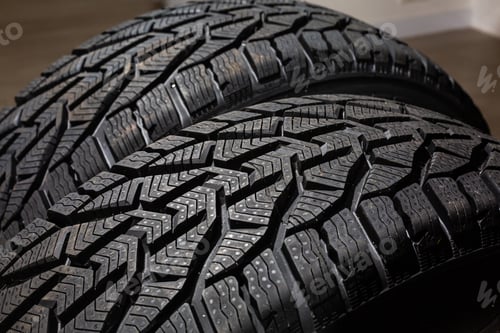 Preview: two black tires on the gray background