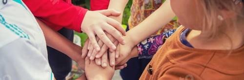 Preview: hands of children, many friends, games. Selective focus