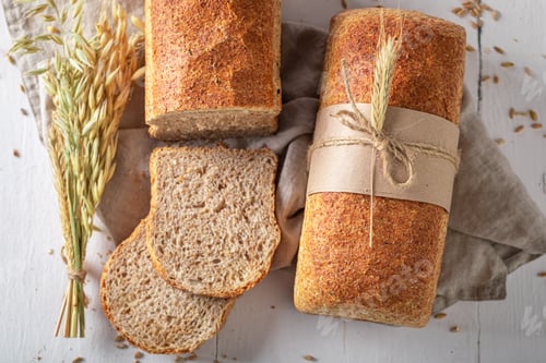 Preview: Healthy loaf of breads baked from country ingredients.