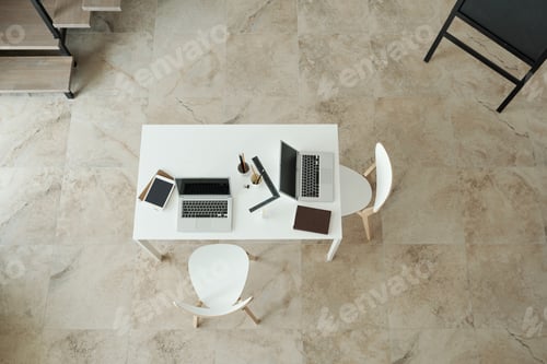Preview: Overview of part of modern office with table and chairs
