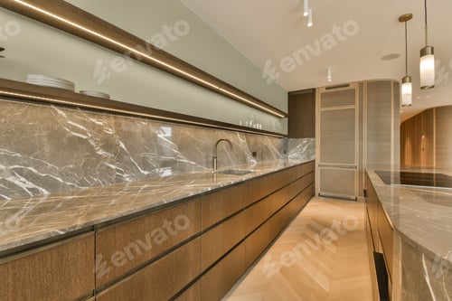 Preview: a large kitchen with marble counter tops and wooden cabinets