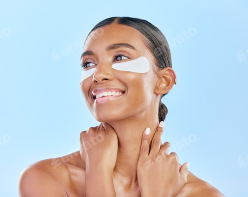 Preview: Eye patch, face and beauty of a happy woman with natural skin glow on a blue background. Dermatolog