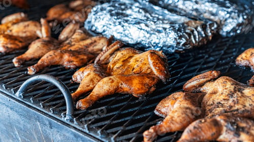 Preview: Frying chickens on a grill. BBQ. Street Food