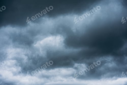 Preview: Overcast sky with dark clouds. Dark sky before a thunder-storm.
