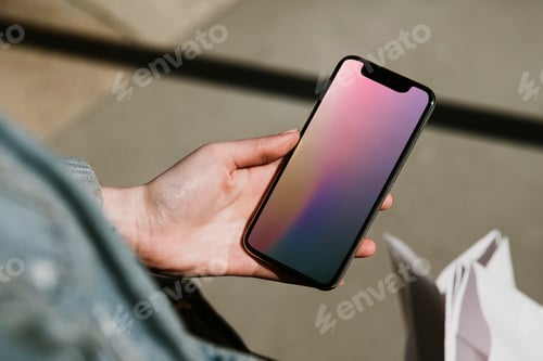 Preview: Woman checking her mobile phone