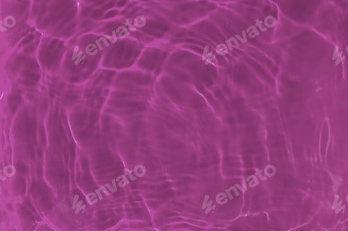 Preview: Transparent Pink Clear Water Surface Texture With Ripples, Waves And Rings In Sunlight.