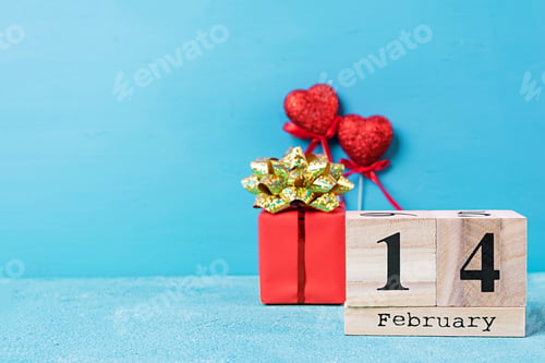 Preview: Valentine day. Wooden calendar with February 14 on it.