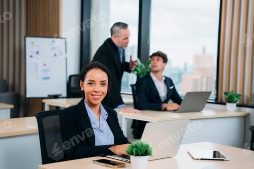 Preview: Business Colleagues Working Together in Modern Office