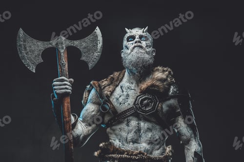Preview: Evil fashion of dead warrior with axe in dark background