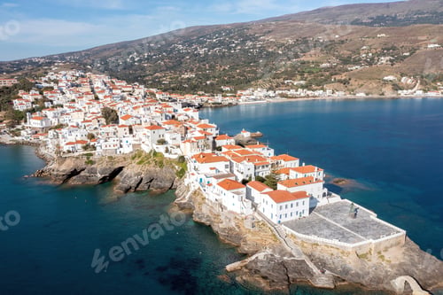 Preview: Greece. Andros Island, Chora town aerial view. Traditional buildings on cape.
