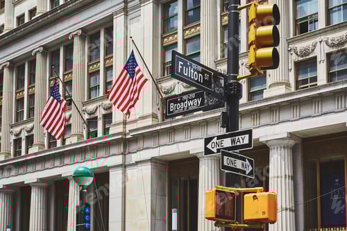 Preview: Sign post and traffic lights in downtown