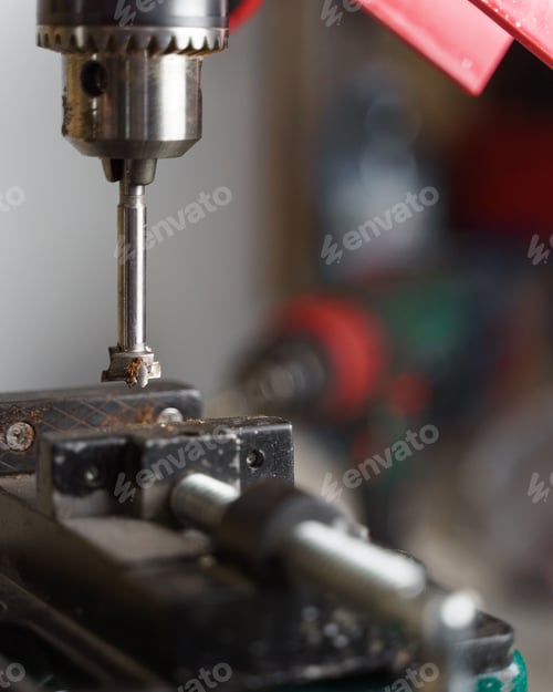 Preview: Vertical of the woodcutting machine on a weathered plank