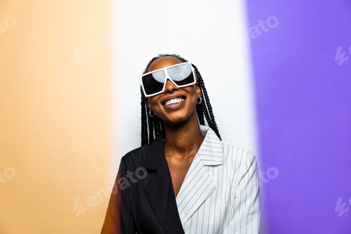 Preview: Beautiful afro woman with pigtails and stylish clothes