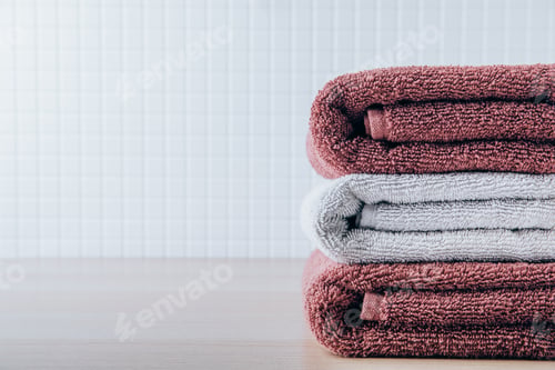 Preview: Towels. Clean fresh fluffy towels on table in bathroom