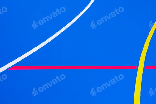 Preview: Red lines crossing a floor painted blue of intense color to use as a minimalist design background.