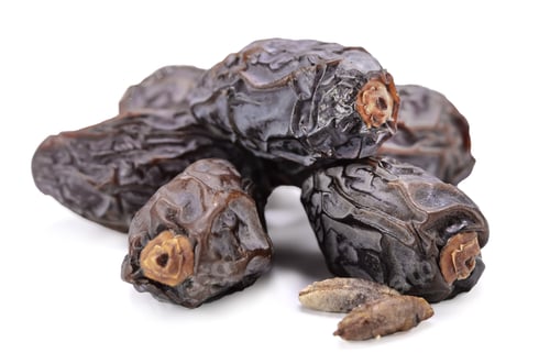 Dried Dates, Close Up on White Background