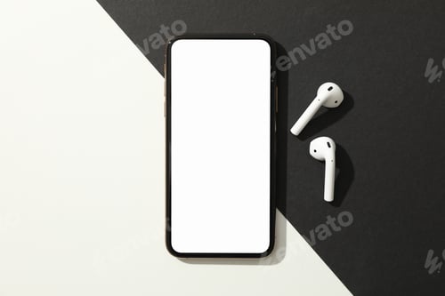 Preview: Phone with empty screen and headphones on black - white background, top view