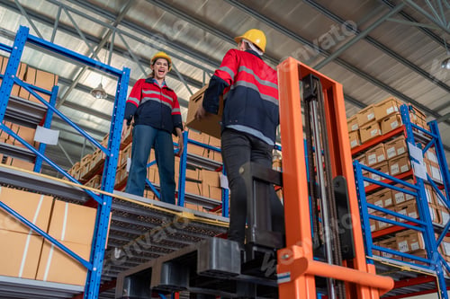 Preview: Warehouse worker working in warehouse storage.