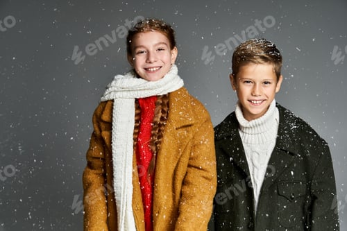Preview: Children wearing cozy winter attire enjoying a snowy day in a warm indoor setting